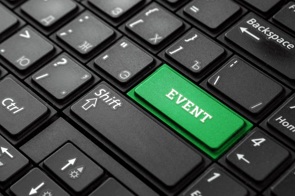 A keyboard with a customized green button that reads "EVENT"