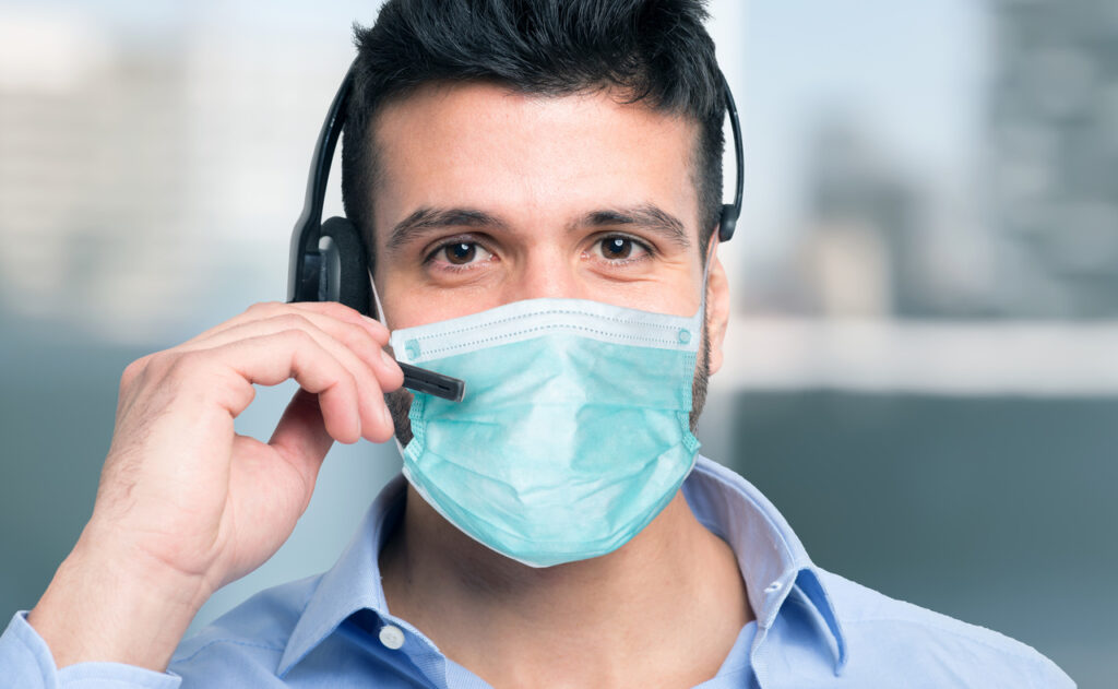 A digital marketer in a mask