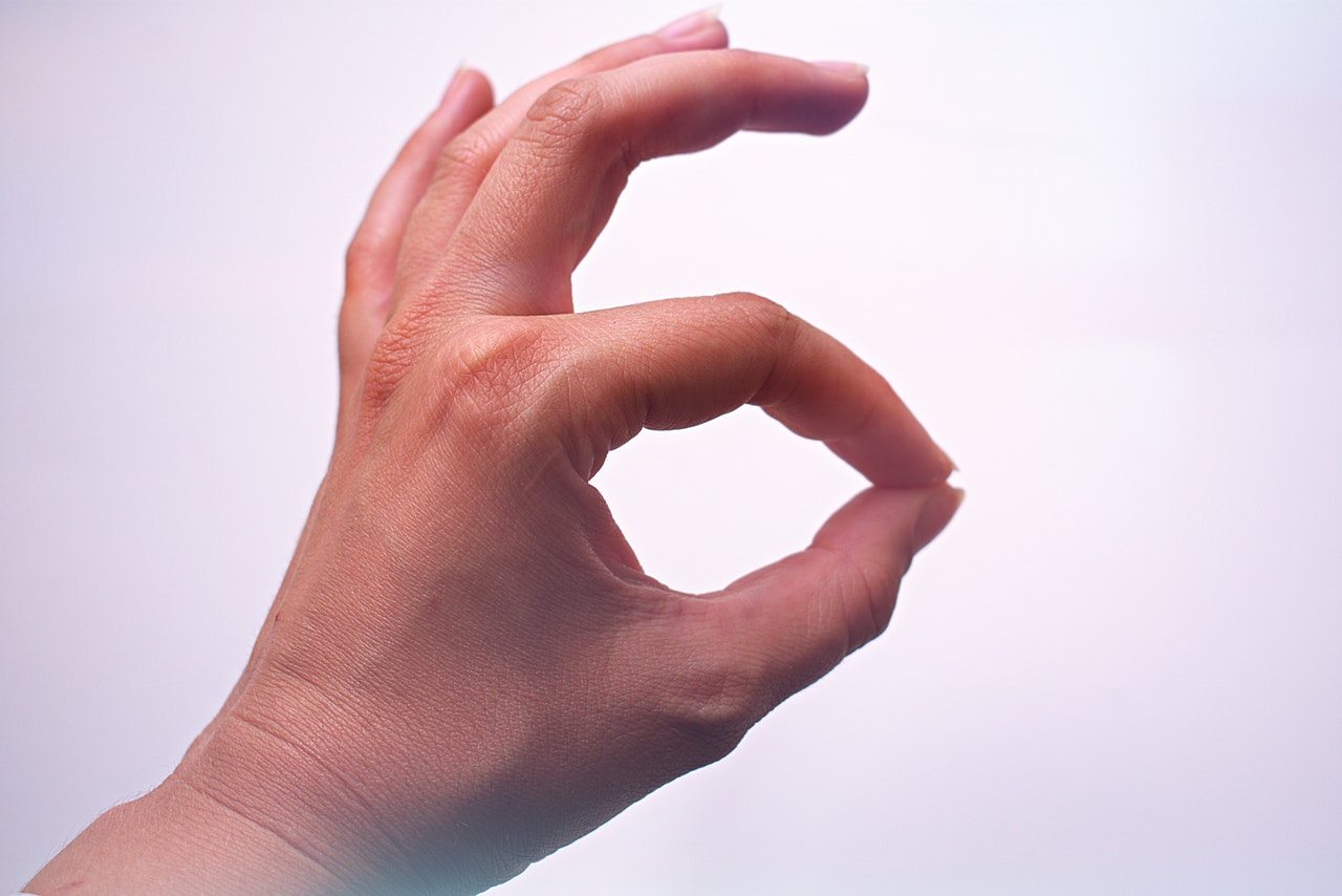A person doing sign language