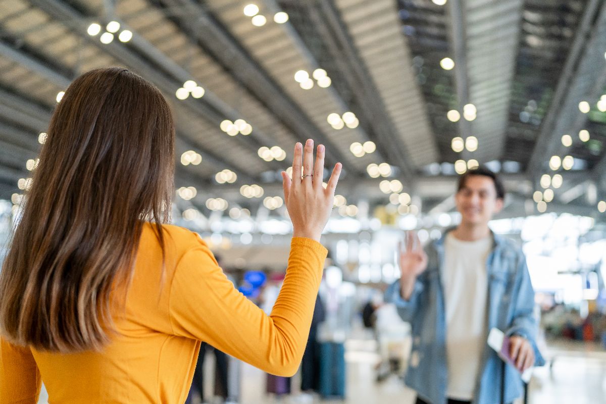 An exhibitor engaging with a potential client during a trade show in the Philippines