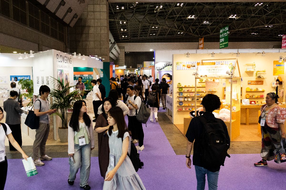 Particpants walking through a trade show in the Philippines